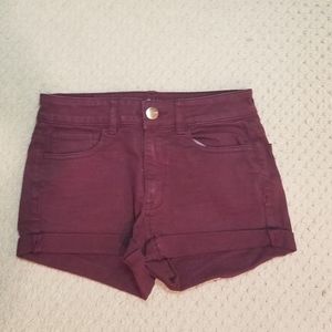 Maroon, high-rise shorts.
